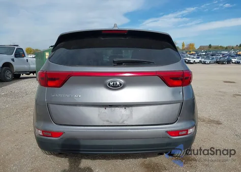 2018 Kia Sportage Lx z USA, uszkodzony, nr VIN KNDPM3AC7J7318297